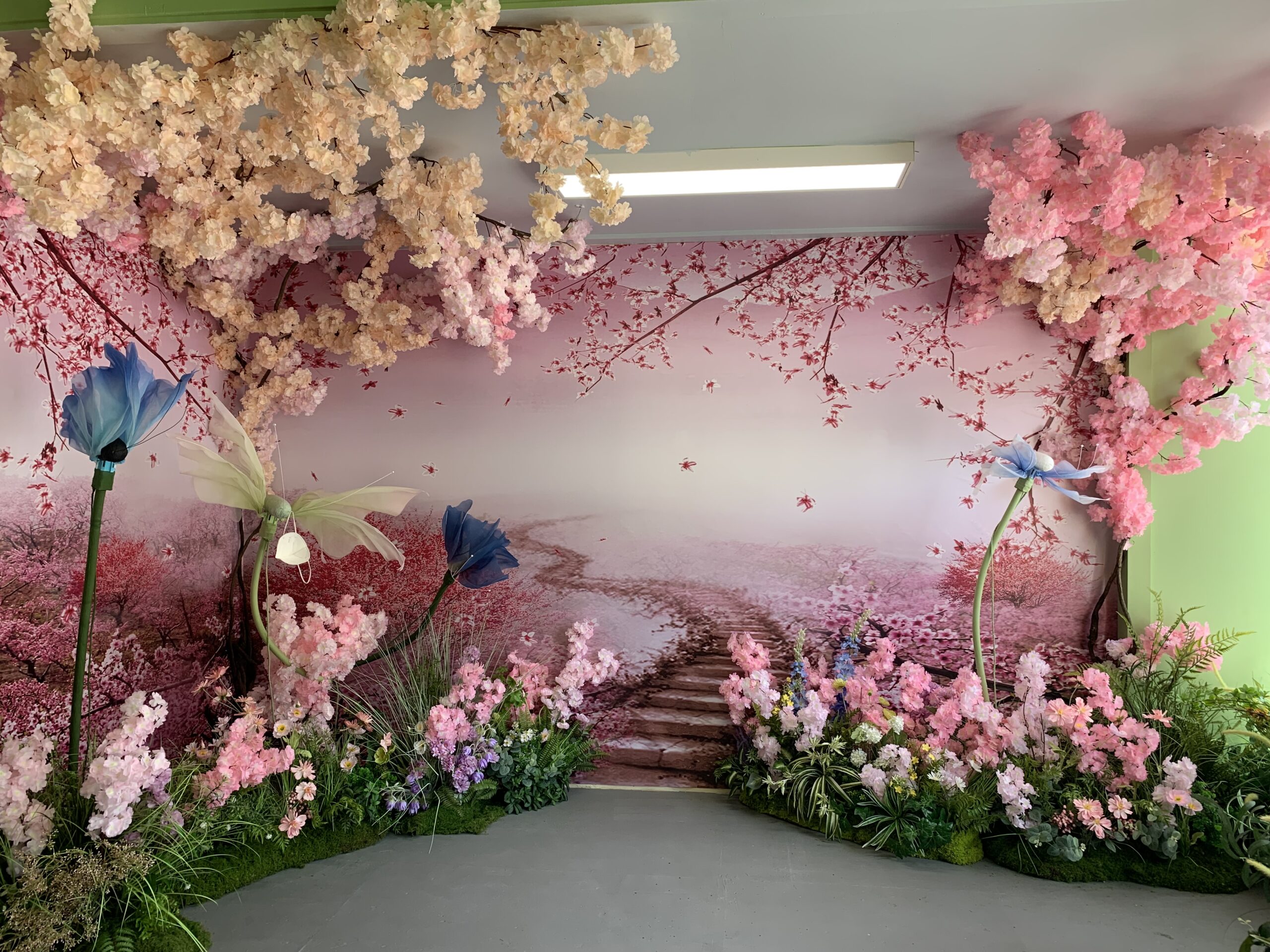 Pink cherry blossom installation inside Happy Humble Hub